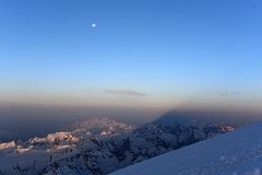 
Shadow Of Mount Elbrus At Sunrise With The Moon Over The Mountains The Southwest
